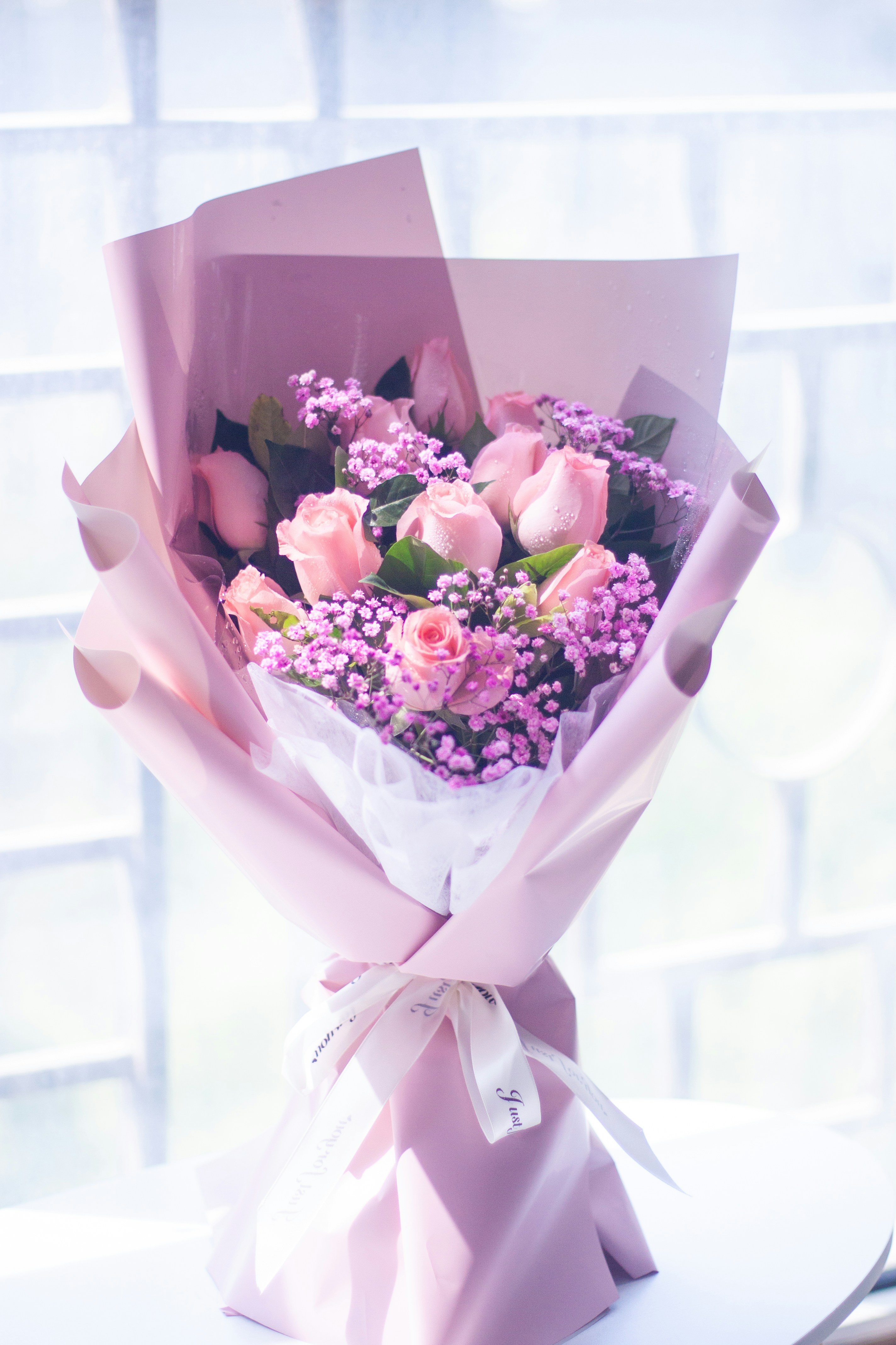 Rosas y flores de Petals of Sun Import LLC